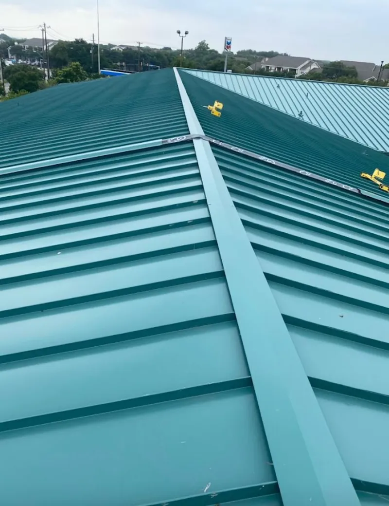 Green commercial metal roof ridge and valley for Metal Roof Repair in Ridgefield Park village
